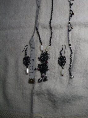 Necklace, earrings, & bracelet. Black metal & beads, scorpion design. Like new.